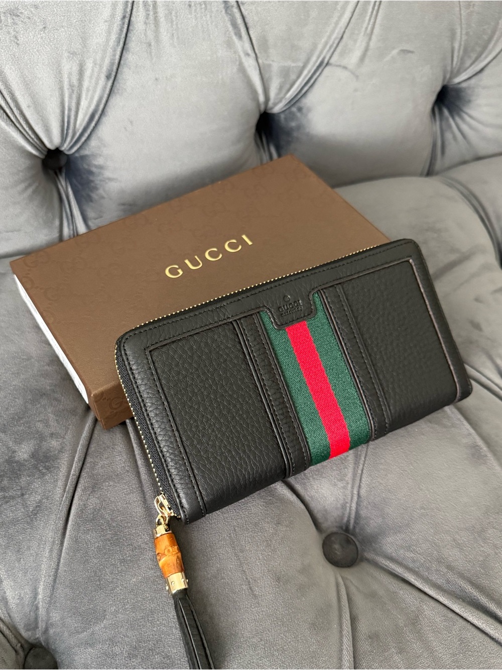 Gucci zip-around  Wallet with signature green-red-green web stripe and tassel